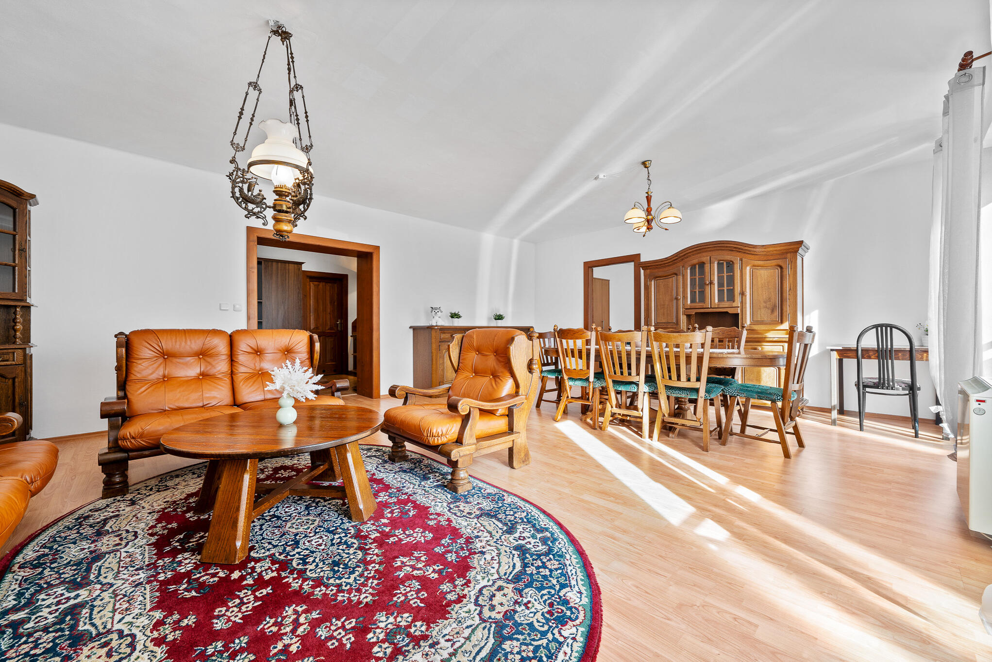 beskydy-remote-work-table-living-room-workplace-kunčice.jpg Spacious and modern living room with a view of Beskydy Mountains.