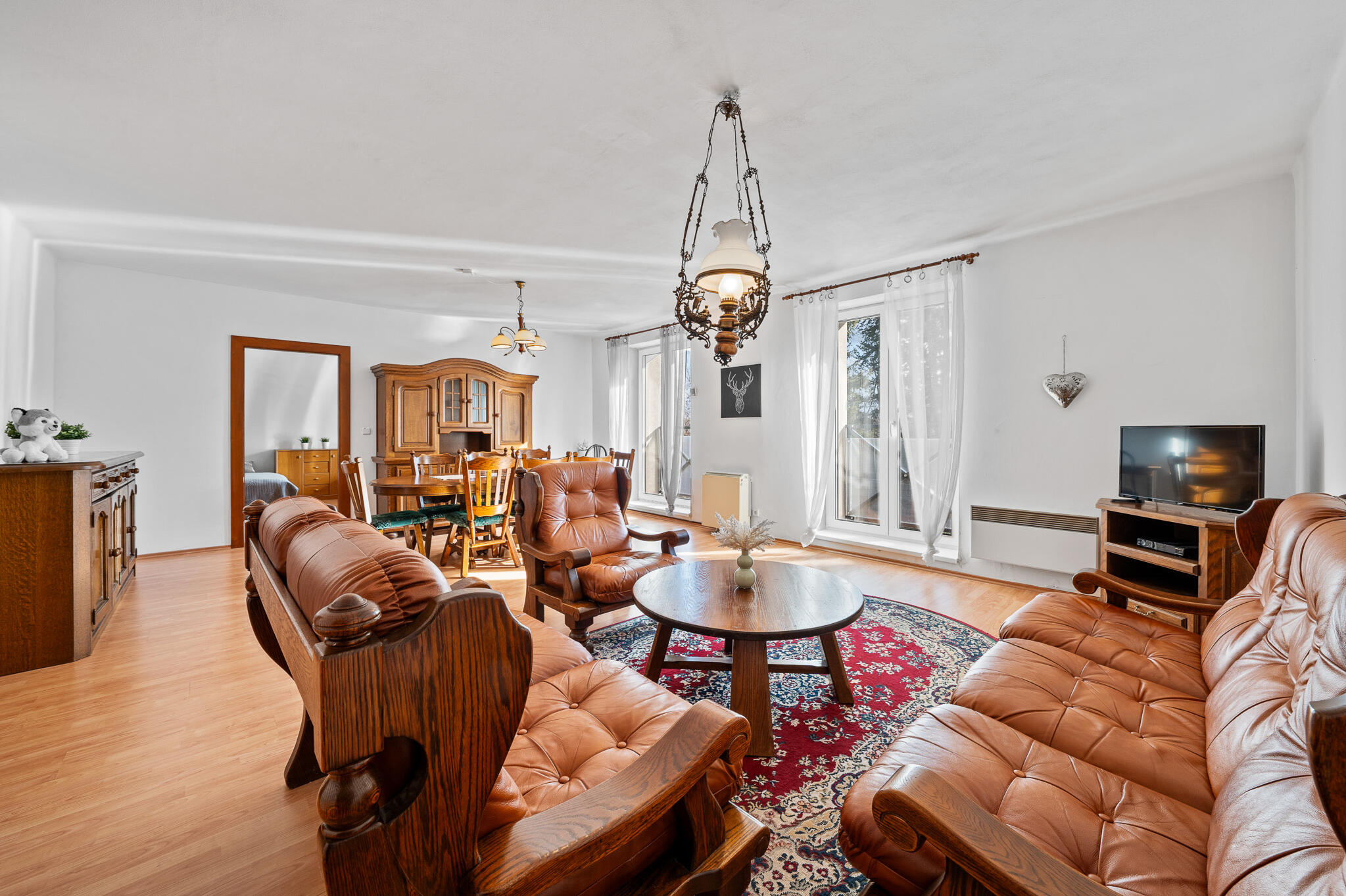 beskydy-apartment-living-room.jpg Spacious and modern living room with a view of Beskydy Mountains.